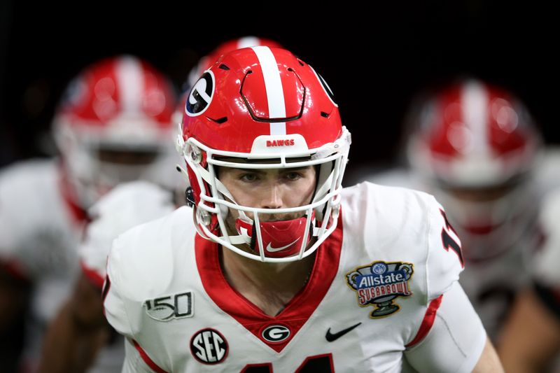 Jan 1, 2020; New Orleans, Louisiana, USA; Georgia Bulldogs quarterback Jake Fromm (11) warms up before his team plays the Baylor Bears in the Sugar Bowl at the Mercedes-Benz Superdome. Mandatory Credit: Chuck Cook-USA TODAY Sports