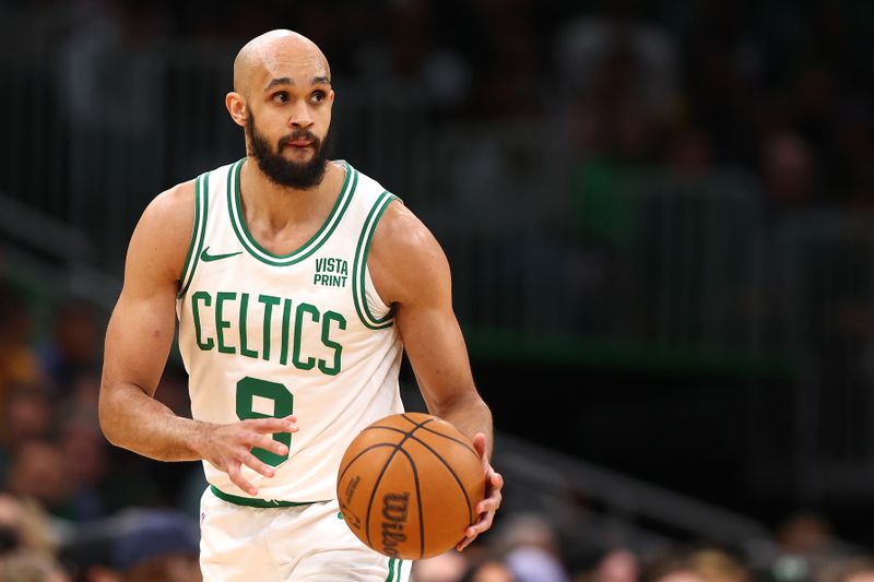 BOSTON, MASSACHUSETTS - MARCH 18: Derrick White #9 of the Boston Celtics dribbles against the Detroit Pistons during the first quarter at TD Garden on March 18, 2024 in Boston, Massachusetts. NOTE TO USER: User expressly acknowledges and agrees that, by downloading and or using this photograph, user is consenting to the terms and conditions of the Getty Images License Agreement. (Photo by Maddie Meyer/Getty Images)