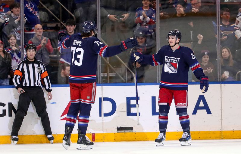 Mar 9, 2024; New York, New York, USA: New York Rangers left wing Jimmy Vesey (26) celebrates his goal with New York Rangers center Matt Rempe (73) during the first period against the St. Louis Blues at Madison Square Garden. Mandatory Credit: Danny Wild-USA TODAY Sports