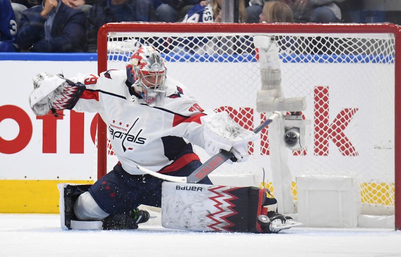 Oct 13, 2022; Toronto, Ontario, CAN;   Washington Capitals goalie Charlie Lindgren (79) makes a toe save against the Toronto Maple Leafs in the second period at Scotiabank Arena. Mandatory Credit: Dan Hamilton-USA TODAY Sports