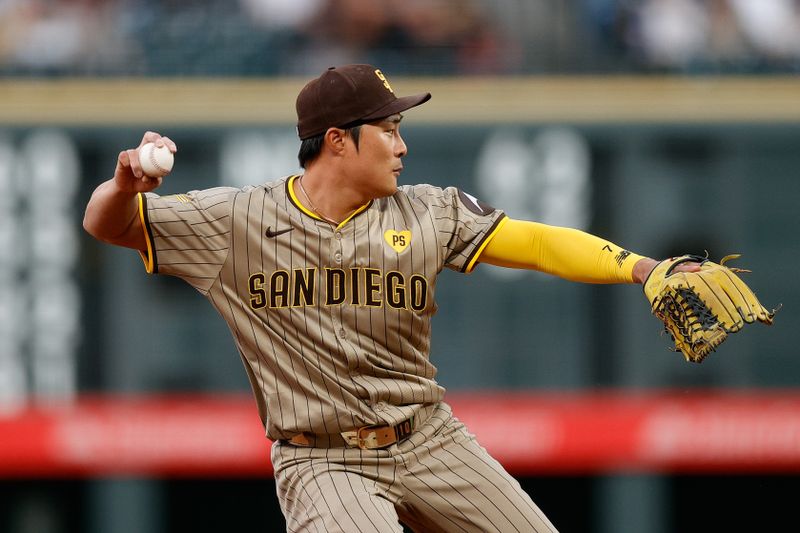 Apr 22, 2024; Denver, Colorado, USA; San Diego Padres shortstop Ha-Seong Kim (7) makes a throw to first for an out in the third inning against the Colorado Rockies at Coors Field. Mandatory Credit: Isaiah J. Downing-USA TODAY Sports