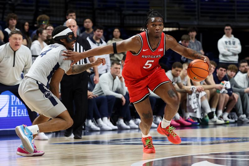 Feb 18, 2026; University Park, Pennsylvania, USA; Rutgers Scarlet Knights guard Darren Buchanan Jr (5) dribbles the ball passed Penn State Nittany Lions guard Kayden Mingo (4) during the second half at Bryce Jordan Center. Mandatory Credit: Matthew O'Haren-Imagn Images