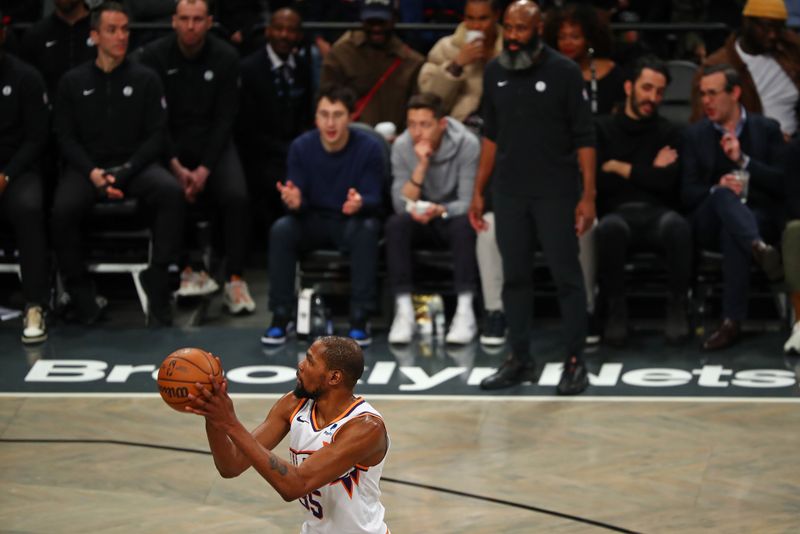 BROOKLYN, NY - JANUARY 31: Kevin Durant #35 of the Phoenix Suns shoots a free throw during the game against the Brooklyn Nets on January 31, 2024 at Barclays Center in Brooklyn, New York. NOTE TO USER: User expressly acknowledges and agrees that, by downloading and or using this Photograph, user is consenting to the terms and conditions of the Getty Images License Agreement. Mandatory Copyright Notice: Copyright 2024 NBAE (Photo by David L. Nemec/NBAE via Getty Images)