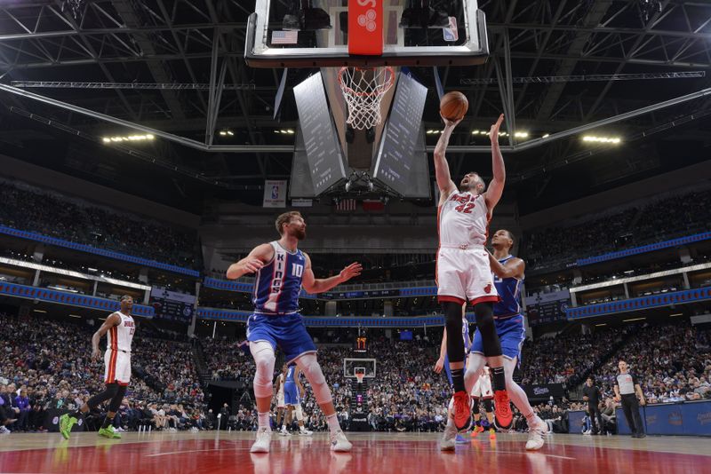 SACRAMENTO, CA - FEBRUARY 26:Kevin Love #42 of the Miami Heat drives to the basket during the game against the Sacramento Kings  on February 26, 2024 at Golden 1 Center in Sacramento, California. NOTE TO USER: User expressly acknowledges and agrees that, by downloading and or using this Photograph, user is consenting to the terms and conditions of the Getty Images License Agreement. Mandatory Copyright Notice: Copyright 2024 NBAE (Photo by Rocky Widner/NBAE via Getty Images)