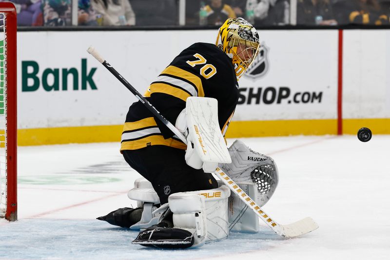 Oct 13, 2025; Boston, Massachusetts, USA; Boston Bruins goaltender Joonas Korpisalo (70) makes a save against the Tampa Bay Lightning during the first period at TD Garden. Mandatory Credit: Winslow Townson-Imagn Images