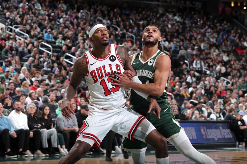 MILWAUKEE, WI - NOVEMBER 20: Torrey Craig #13 of Chicago Bulls and Andre Jackson Jr. #44 of the Milwaukee Bucks wait for a rebound during the game on November 20, 2024 at the Fiserv Forum Center in Milwaukee, Wisconsin. NOTE TO USER: User expressly acknowledges and agrees that, by downloading and or using this Photograph, user is consenting to the terms and conditions of the Getty Images License Agreement. Mandatory Copyright Notice: Copyright 2024 NBAE (Photo by Gary Dineen/NBAE via Getty Images).