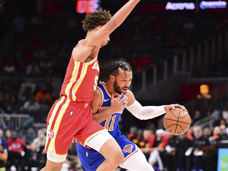 ATLANTA, GA - November 6:  Jalen Brunson #11 of the New York Knicks drives to the basket during the game against the Atlanta Hawks on November 6, 2024 at State Farm Arena in Atlanta, Georgia.  NOTE TO USER: User expressly acknowledges and agrees that, by downloading and/or using this Photograph, user is consenting to the terms and conditions of the Getty Images License Agreement. Mandatory Copyright Notice: Copyright 2024 NBAE (Photo by Adam Hagy/NBAE via Getty Images)