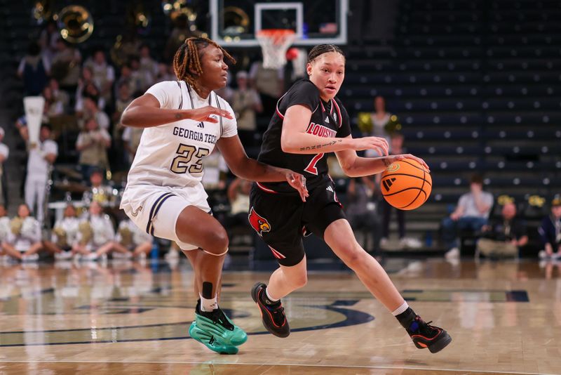 Feb 26, 2026; Atlanta, Georgia, USA; Louisville Cardinals guard Imari Berry (2) drives past Georgia Tech Yellow Jackets guard La'nya Foster (23) in the first quarter at McCamish Pavilion. Mandatory Credit: Brett Davis-Imagn Images