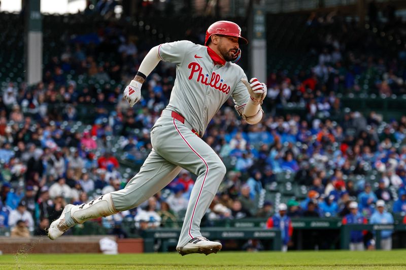 Apr 25, 2025; Chicago, Illinois, USA; Philadelphia Phillies right fielder Nick Castellanos (8) runs after hitting a double against the Chicago Cubs during the sixth inning at Wrigley Field. Mandatory Credit: Kamil Krzaczynski-Imagn Images