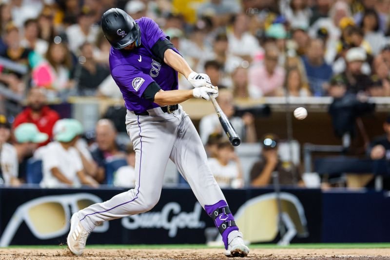 Aug 2, 2024; San Diego, California, USA; Colorado Rockies right fielder Kris Bryant (23) hits a two run single during the sixth inning against the San Diego Padres at Petco Park. Mandatory Credit: David Frerker-USA TODAY Sports