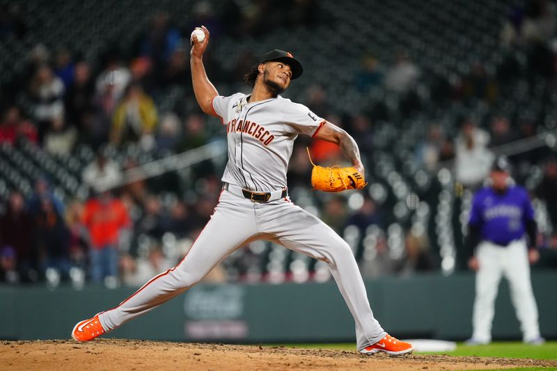 May 8, 2024; Denver, Colorado, USA; San Francisco Giants pitcher Camilo Doval (75) delivers a pitch in the ninth inning against the Colorado Rockies at Coors Field. Mandatory Credit: Ron Chenoy-USA TODAY Sports