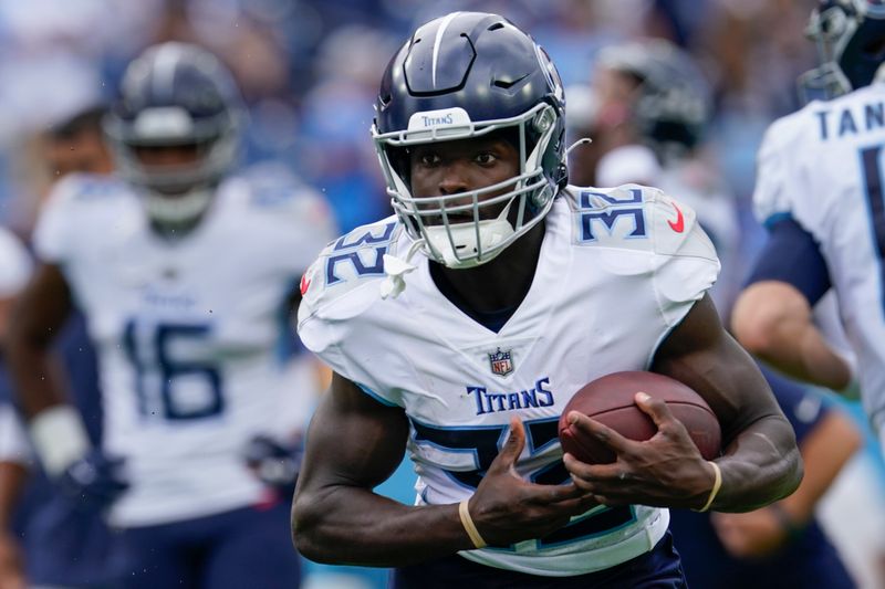 Tennessee Titans running back Tyjae Spears (32) warms up before an NFL football game against the Los Angeles Chargers, Sunday, Sept. 17, 2023, in Nashville, Tenn. (AP Photo/George Walker IV)