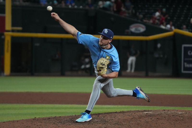 Apr 23, 2025; Phoenix, Arizona, USA; Tampa Bay Rays pitcher Eric Orze (17) throws against the Arizona Diamondbacks during the eleventh inning at Chase Field. Mandatory Credit: Rick Scuteri-Imagn Images