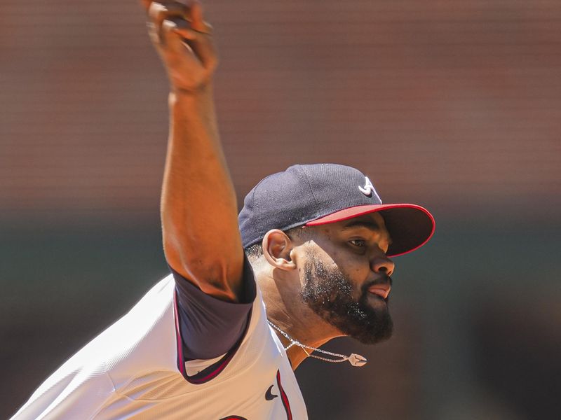 May 20, 2024; Cumberland, Georgia, USA; Atlanta Braves starting pitcher Reynaldo Lopez (40) pitches against the San Diego Padres during the first inning at Truist Park. Mandatory Credit: Dale Zanine-USA TODAY Sports