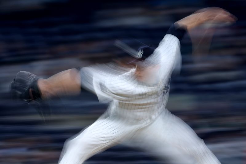Aug 7, 2024; Bronx, New York, USA; New York Yankees relief pitcher Tim Hill (54) pitches against the Los Angeles Angels during the eighth inning at Yankee Stadium. Mandatory Credit: Brad Penner-USA TODAY Sports