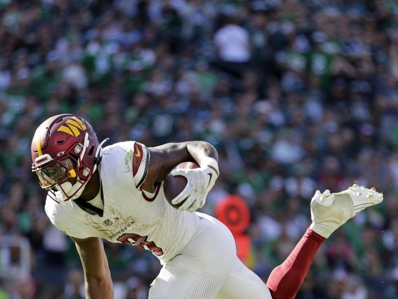 Washington Commanders running back Brian Robinson Jr. (8) in action against the Philadelphia Eagles during an NFL football game, Sunday, Oct. 1, 2023, in Philadelphia. The Eagles defeated the Commanders 34-31. (AP Photo/Rich Schultz)