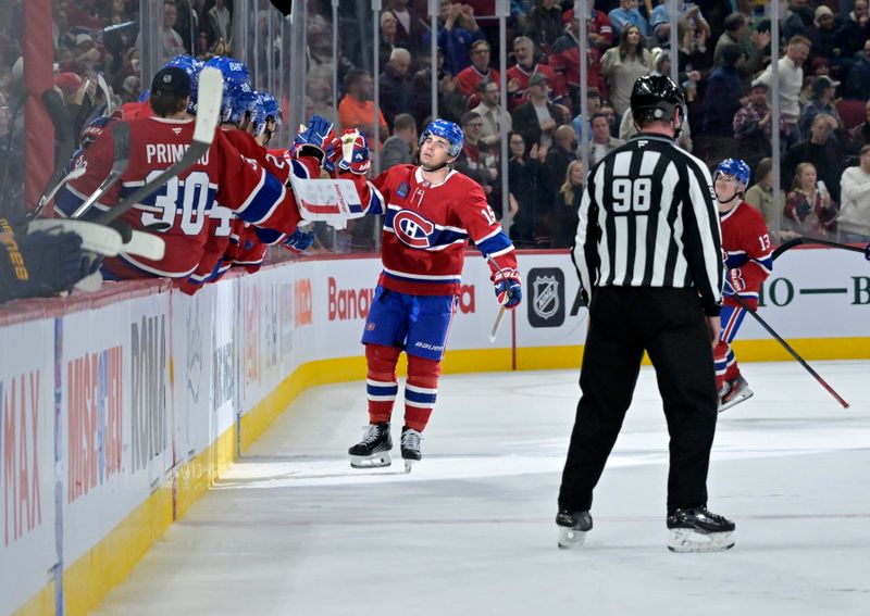 Oct 26, 2024; Montreal, Quebec, CAN; Montreal Canadiens forward Alex Newhook (15) celebrates with teammates after scoring a goal against the St.Louis Blues during the second period at the Bell Centre. Mandatory Credit: Eric Bolte-Imagn Images