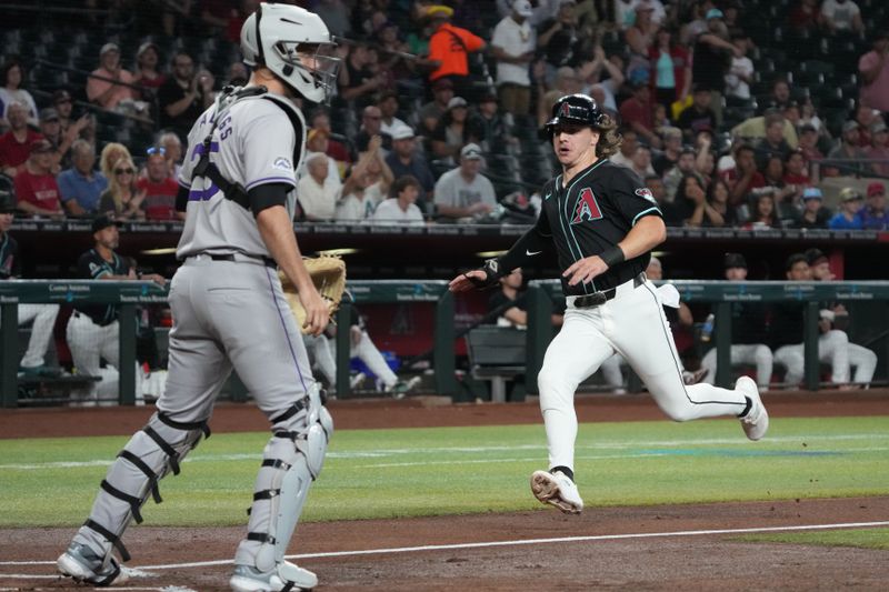 Aug 14, 2024; Phoenix, Arizona, USA; Arizona Diamondbacks outfielder Jake McCarthy (31) scores a run against the Colorado Rockies in the first inning at Chase Field. Mandatory Credit: Rick Scuteri-USA TODAY Sports