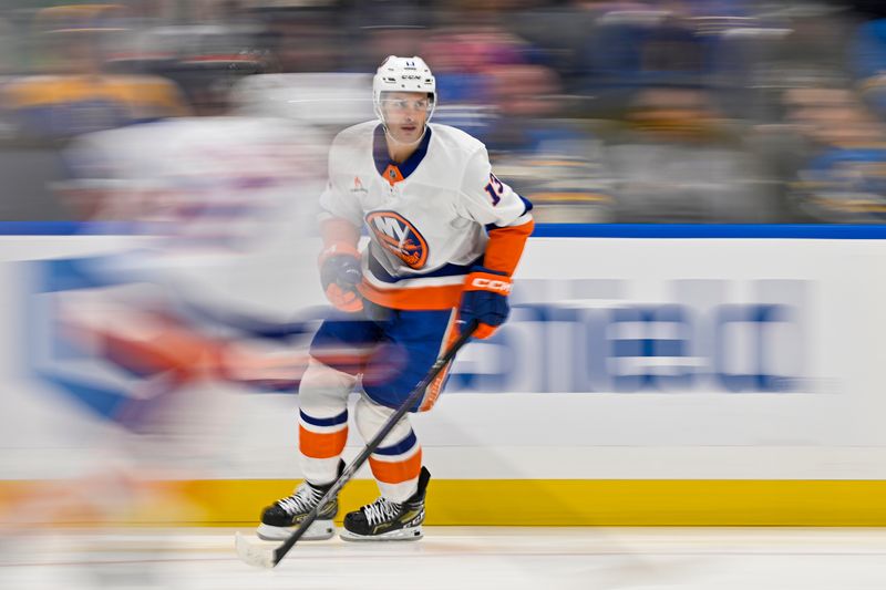 Oct 17, 2024; St. Louis, Missouri, USA;  New York Islanders center Mathew Barzal (13) skates against the St. Louis Blues during the second period at Enterprise Center. Mandatory Credit: Jeff Curry-Imagn Images