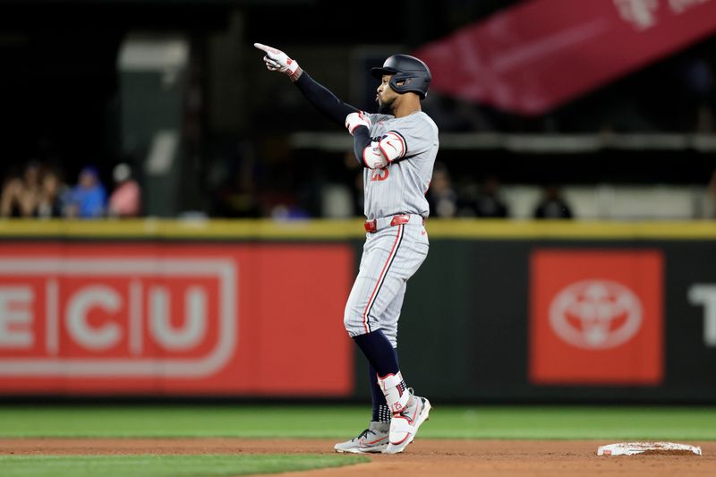 Jun 29, 2024; Seattle, Washington, USA; Minnesota Twins outfielder Byron Buxton (25) celebrates from second base after hitting an RBI double against the Seattle Mariners during the fourth inning at T-Mobile Park. Mandatory Credit: John Froschauer-USA TODAY Sports