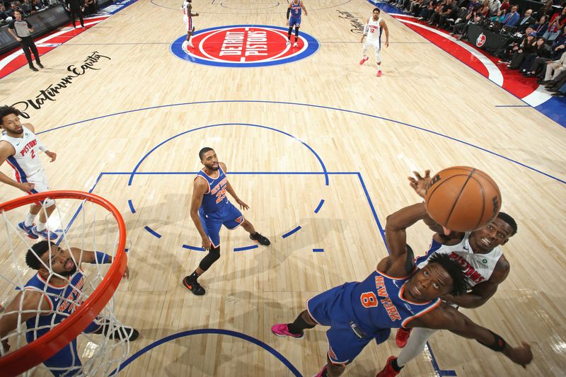 DETROIT, MI - APRIL 27: OG Anunoby #8 of the New York Knicks goes up for the rebound during the game against the Detroit Pistons  during Round 1 Game 4 of the 2025 NBA Playoffs on April 27, 2025 at Little Caesars Arena in Detroit, Michigan. NOTE TO USER: User expressly acknowledges and agrees that, by downloading and/or using this photograph, User is consenting to the terms and conditions of the Getty Images License Agreement. Mandatory Copyright Notice: Copyright 2025 NBAE (Photo by Nathaniel S. Butler/NBAE via Getty Images)