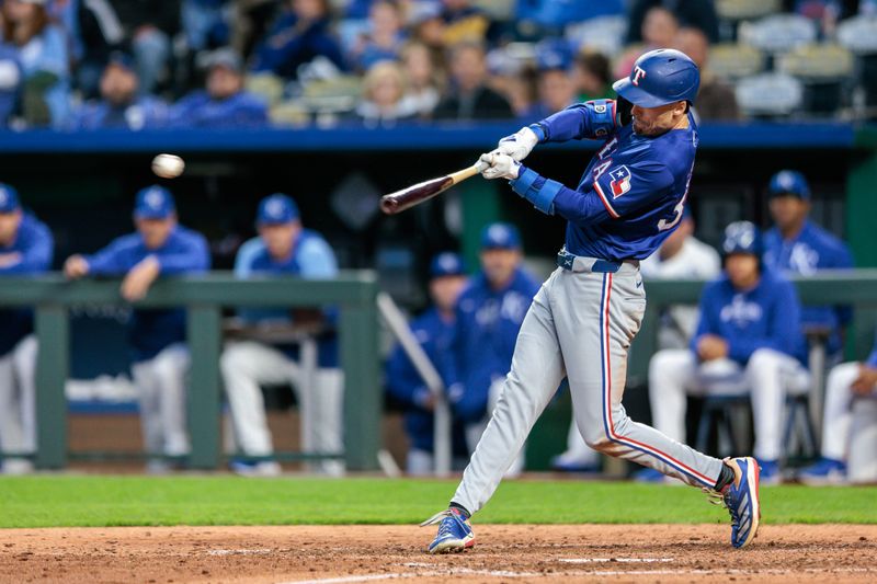 May 4, 2024; Kansas City, Missouri, USA; Texas Rangers outfielder Leody Taveras (3) at bat during the seventh inning against the Kansas City Royals at Kauffman Stadium. Mandatory Credit: William Purnell-USA TODAY Sports