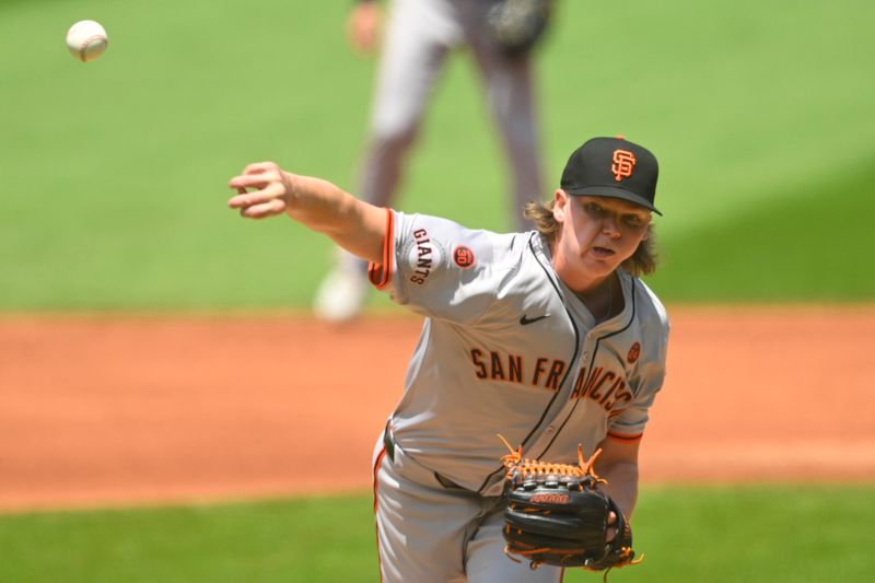 Jul 7, 2024; Cleveland, Ohio, USA; San Francisco Giants starting pitcher Hayden Birdsong (60) delivers a pitch in the first inning against the Cleveland Guardians at Progressive Field. Mandatory Credit: David Richard-USA TODAY Sports