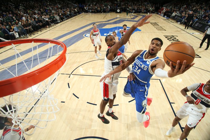 MILWAUKEE, WI - NOVEMBER 30: Giannis Antetokounmpo #34 of the Milwaukee Bucks drives to the basket during the game against the Washington Wizards on November 30, 2024 at Fiserv Forum Center in Milwaukee, Wisconsin. NOTE TO USER: User expressly acknowledges and agrees that, by downloading and or using this Photograph, user is consenting to the terms and conditions of the Getty Images License Agreement. Mandatory Copyright Notice: Copyright 2024 NBAE (Photo by Gary Dineen/NBAE via Getty Images).