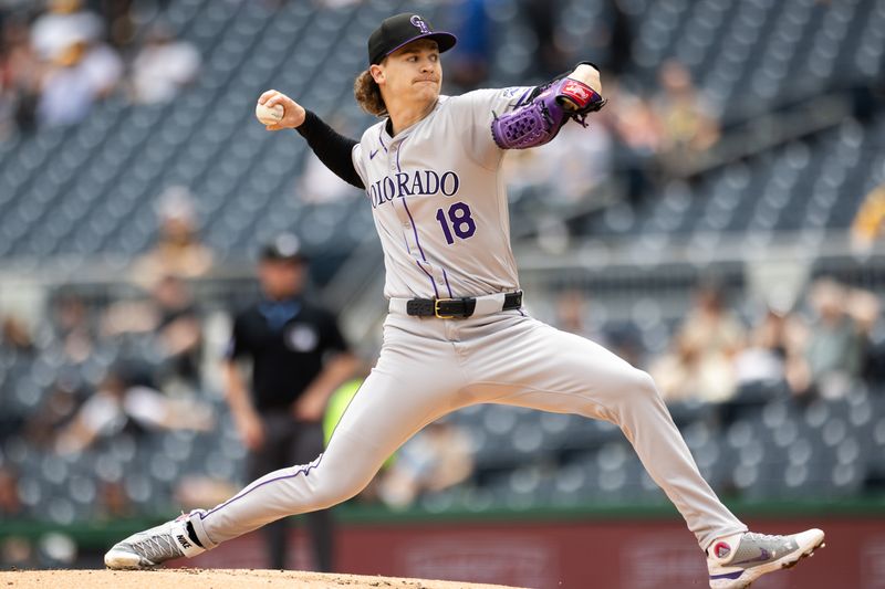 May 5, 2024; Pittsburgh, Pennsylvania, USA; Colorado Rockies starting pitcher Ryan Feltner (18) pitches against the Pittsburgh Pirates during the first inning at PNC Park. Mandatory Credit: Scott Galvin-USA TODAY Sports