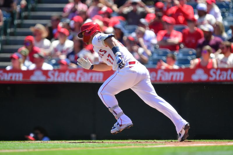 Apr 6, 2025; Anaheim, California, USA; Los Angeles Angels designated hitter Mike Trout (27) runs after hitting a single against the Cleveland Guardians during the first inning at Angel Stadium. Mandatory Credit: Gary A. Vasquez-Imagn Images