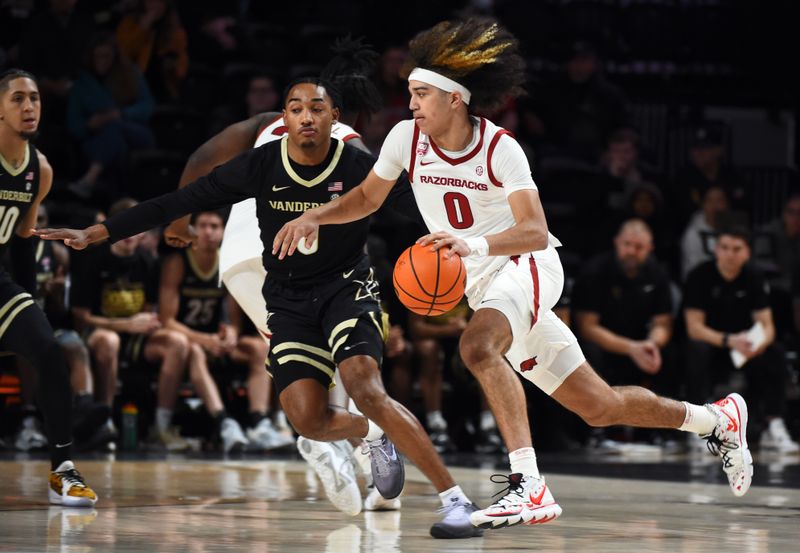 Jan 14, 2023; Nashville, Tennessee, USA; Arkansas Razorbacks guard Anthony Black (0) works against Vanderbilt Commodores guard Tyrin Lawrence (0) during the first half at Memorial Gymnasium. Mandatory Credit: Christopher Hanewinckel-USA TODAY Sports