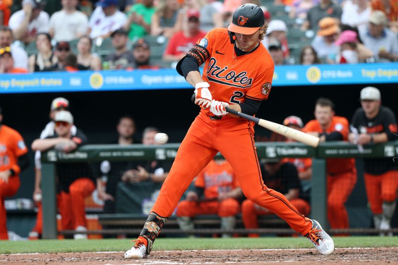 May 17, 2025; Baltimore, Maryland, USA; Baltimore Orioles shortstop Gunnar Henderson (2) hits a single during the eighth inning against the Washington Nationals at Oriole Park at Camden Yards. Mandatory Credit: Daniel Kucin Jr.-Imagn Images