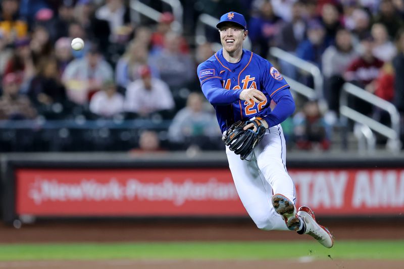 Sep 30, 2023; New York City, New York, USA; New York Mets third baseman Brett Baty (22) throws out Philadelphia Phillies left fielder Cristian Pache (not pictured) at first on a ground ball during the second inning at Citi Field. Mandatory Credit: Brad Penner-USA TODAY Sports