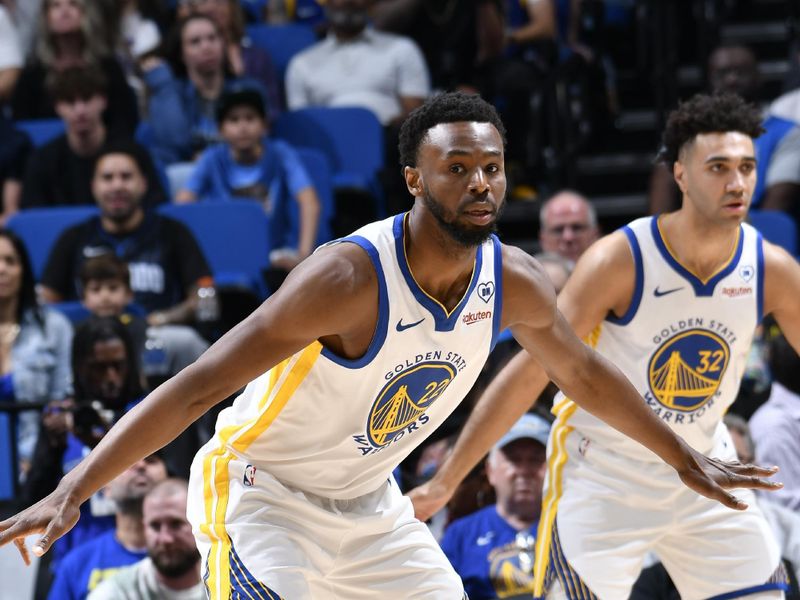 ORLANDO, FL - MARCH 27: Andrew Wiggins #22 of the Golden State Warriors plays defense during the game against the Orlando Magic on March 27, 2024 at Amway Center in Orlando, Florida. NOTE TO USER: User expressly acknowledges and agrees that, by downloading and or using this photograph, User is consenting to the terms and conditions of the Getty Images License Agreement. Mandatory Copyright Notice: Copyright 2024 NBAE (Photo by Fernando Medina/NBAE via Getty Images)