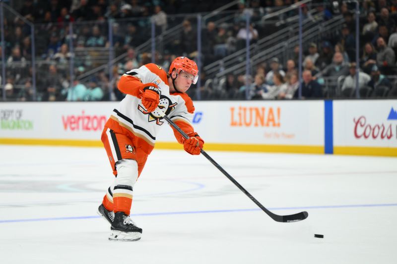 Oct 9, 2025; Seattle, Washington, USA; Anaheim Ducks defenseman Jackson LaCombe (2) shoots the puck against the Seattle Kraken during the third period at Climate Pledge Arena. Mandatory Credit: Steven Bisig-Imagn Images