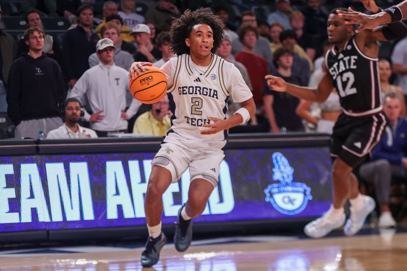 Dec 3, 2025; Atlanta, Georgia, USA; Georgia Tech Yellow Jackets guard Eric Chatfield Jr. (2) dribbles against the Mississippi State Bulldogs in the second half at McCamish Pavilion. Mandatory Credit: Brett Davis-Imagn Images
