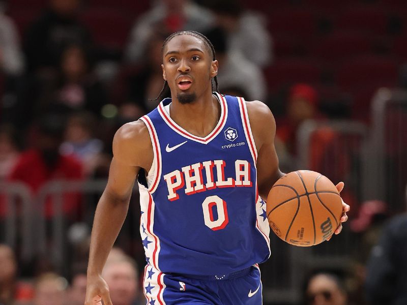 CHICAGO, ILLINOIS - DECEMBER 08: Tyrese Maxey #0 of the Philadelphia 76ers dribbles up the court against the Chicago Bulls during the first half at the United Center on December 08, 2024 in Chicago, Illinois. NOTE TO USER: User expressly acknowledges and agrees that, by downloading and or using this photograph, User is consenting to the terms and conditions of the Getty Images License Agreement.  (Photo by Michael Reaves/Getty Images)