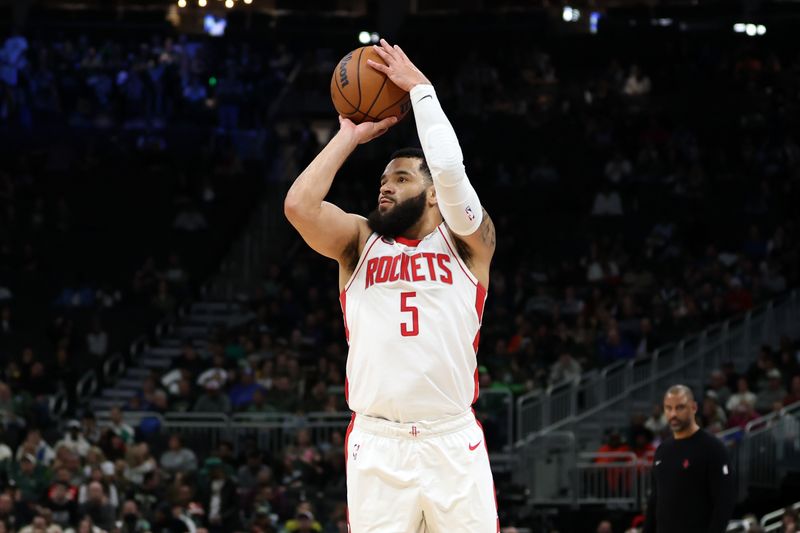 MILWAUKEE, WISCONSIN - NOVEMBER 18: Fred VanVleet #5 of the Houston Rockets takes a shot during the first half of a game against the Milwaukee Bucks at Fiserv Forum on November 18, 2024 in Milwaukee, Wisconsin. NOTE TO USER: User expressly acknowledges and agrees that, by downloading and or using this photograph, User is consenting to the terms and conditions of the Getty Images License Agreement. (Photo by Stacy Revere/Getty Images)