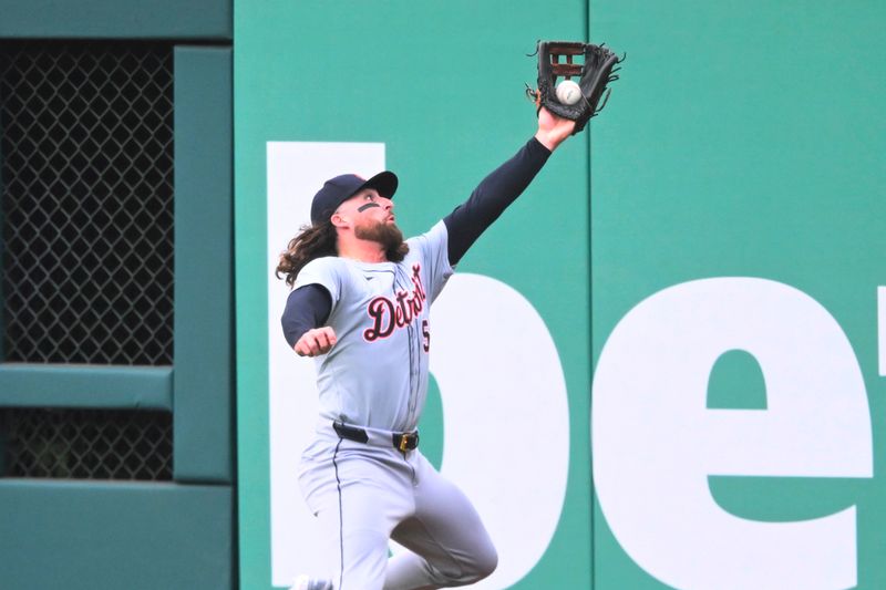 May 7, 2024; Cleveland, Ohio, USA; Detroit Tigers right fielder Ryan Vilade (50) makes a catch near the wall in the first inning against the Cleveland Guardians at Progressive Field. Mandatory Credit: David Richard-USA TODAY Sports