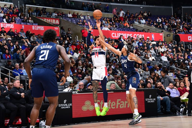 LOS ANGELES, CA - MARCH 1: Jules Bernard #14 of the Washington Wizards shoots the ball during the game against the LA Clippers on March 1, 2024 at Crypto.Com Arena in Los Angeles, California. NOTE TO USER: User expressly acknowledges and agrees that, by downloading and/or using this Photograph, user is consenting to the terms and conditions of the Getty Images License Agreement. Mandatory Copyright Notice: Copyright 2024 NBAE (Photo by Adam Pantozzi/NBAE via Getty Images)