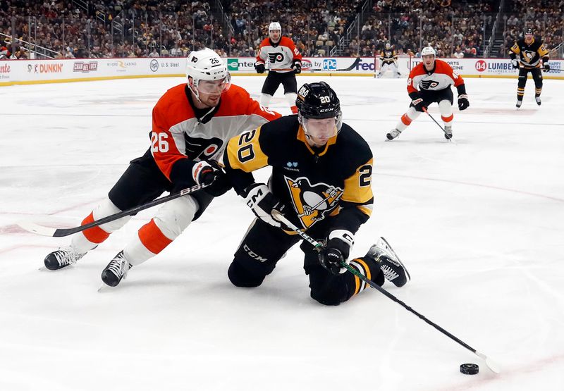 Feb 25, 2024; Pittsburgh, Pennsylvania, USA;  Pittsburgh Penguins center Lars Eller (20) plays the puck from his knees against Philadelphia Flyers defenseman Sean Walker (26) during the second period at PPG Paints Arena. Mandatory Credit: Charles LeClaire-USA TODAY Sports