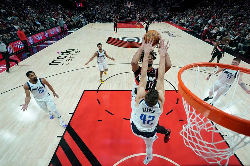 PORTLAND, OREGON - DECEMBER 01: Shaedon Sharpe #17 of the Portland Trail Blazers shoots the ball against Maxi Kleber #42 of the Dallas Mavericks during the first half at Moda Center on December 01, 2024 in Portland, Oregon. NOTE TO USER: User expressly acknowledges and agrees that, by downloading and or using this photograph, User is consenting to the terms and conditions of the Getty Images License Agreement. (Photo by Soobum Im/Getty Images)