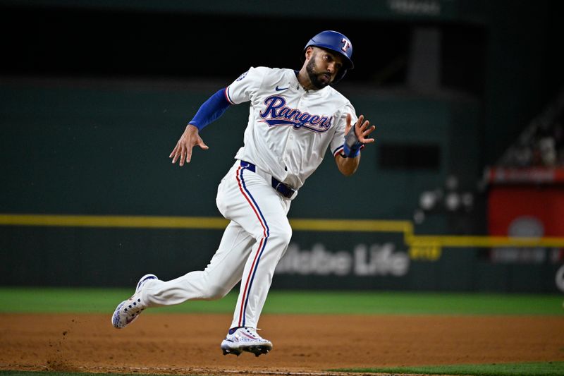 Sep 17, 2024; Arlington, Texas, USA; Texas Rangers second baseman Marcus Semien (2) scores against the Toronto Blue Jays during the fourth inning at Globe Life Field. Mandatory Credit: Jerome Miron-Imagn Images