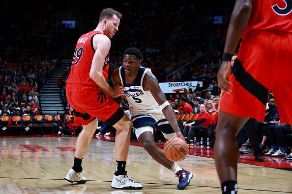 TORONTO, CANADA - OCTOBER 25: Anthony Edwards #5 of the Minnesota Timberwolves drives to the basket during the game against the Toronto Raptors on October 25, 2023 at the Scotiabank Arena in Toronto, Ontario, Canada.  NOTE TO USER: User expressly acknowledges and agrees that, by downloading and or using this Photograph, user is consenting to the terms and conditions of the Getty Images License Agreement.  Mandatory Copyright Notice: Copyright 2023 NBAE (Photo by Vaughn Ridley/NBAE via Getty Images)