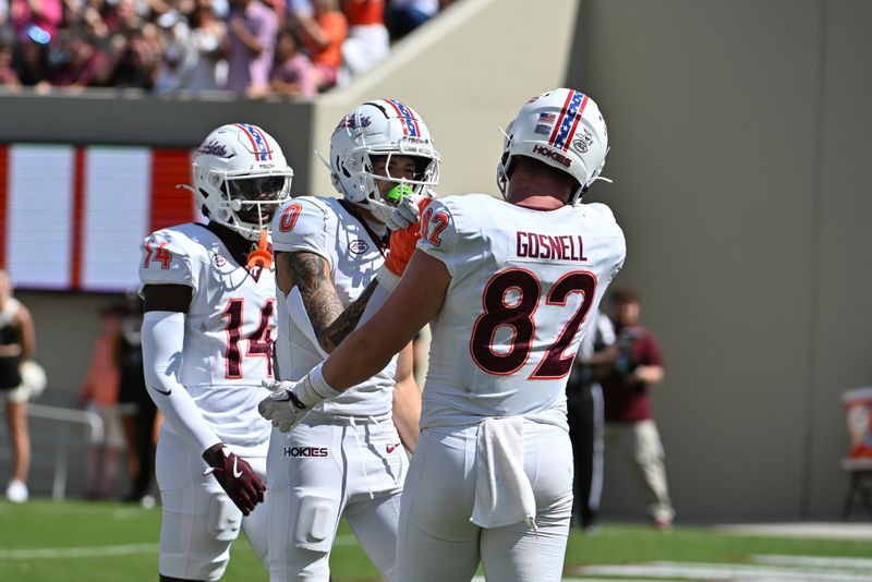 Sep 20, 2025; Blacksburg, Virginia, USA;  Virginia Tech Hokies tight end Benji Gosnell (82) congratulates Virginia Tech Hokies wide receiver Ayden Greene (0) on a touchdown during the second quarter at Lane Stadium. Mandatory Credit: Brian Bishop-Imagn Images