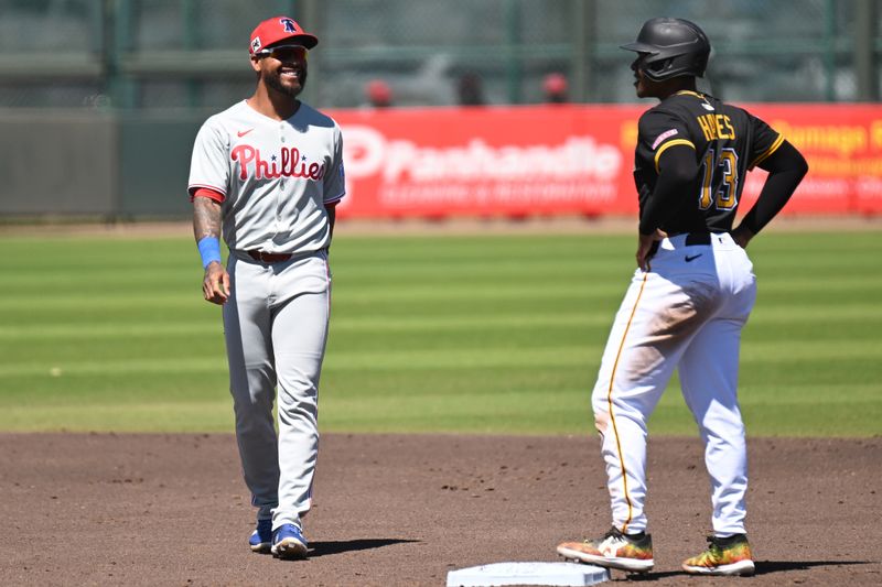 Mar 18, 2025; Bradenton, Florida, USA; Pittsburgh Pirates third baseman KeíBryan Hayes (13) and Philadelphia Phillies shortstop Edmundo Sosa (33) talk in between pitches  in the third  inning during spring training at LECOM Park. Mandatory Credit: Jonathan Dyer-Imagn Images