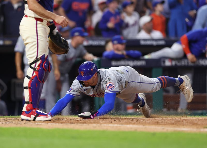 Oct 5, 2024; Philadelphia, PA, USA; New York Mets outfielder Brandon Nimmo (9) scores a run against the Philadelphia Phillies in the eighth inning in game one of the NLDS for the 2024 MLB Playoffs at Citizens Bank Park. Mandatory Credit: Bill Streicher-Imagn Images