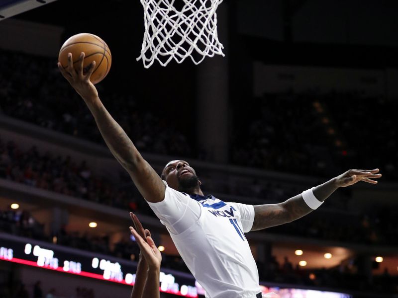 DES MOINES, IA -  OCTOBER 11: Naz Reid #11 of the Minnesota Timberwolves drives to the basket during the game against the Philadelphia 76ers during a NBA pre season game on October 11, 2024 at the Wells Fargo Arena in Des Moines, Iowa. NOTE TO USER: User expressly acknowledges and agrees that, by downloading and or using this Photograph, user is consenting to the terms and conditions of the Getty Images License Agreement. Mandatory Copyright Notice: Copyright 2024 NBAE (Photo by Jasey Bradwell/NBAE via Getty Images)