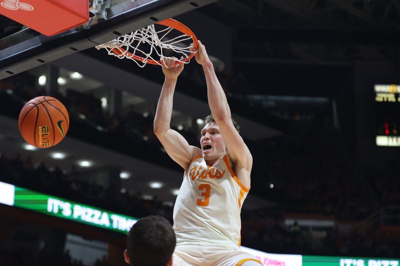 Feb 28, 2024; Knoxville, Tennessee, USA; Tennessee Volunteers guard Dalton Knecht (3) dunks the ball against the Auburn Tigers during the second half at Thompson-Boling Arena at Food City Center. Mandatory Credit: Randy Sartin-USA TODAY Sports