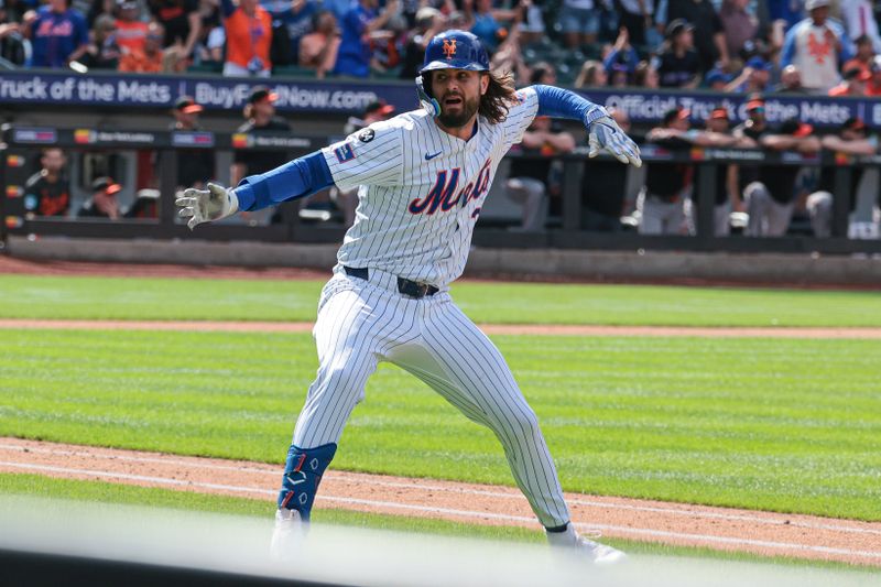 Aug 21, 2024; New York City, New York, USA; New York Mets left fielder Jesse Winker (3) celebrates after hitting a game-winning solo home run during the bottom of the ninth inning against the Baltimore Orioles at Citi Field. Mandatory Credit: Vincent Carchietta-USA TODAY Sports